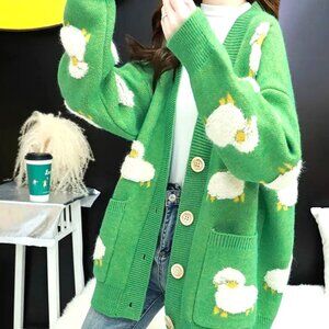 THE GREATEST CARDIGAN EVER! AN OVERSIZED GRASS GREEN CARDI COVERED IN SHEEP!